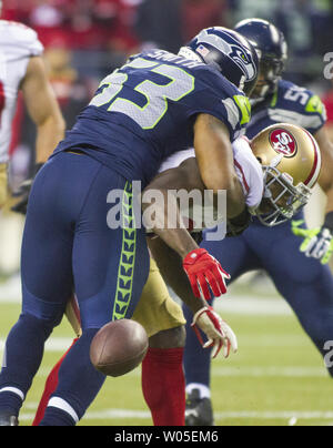 San Francisco 49ers linebacker Malcolm Smith (51) tackles New York ...