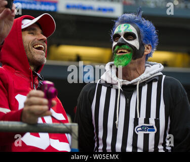 https://l450v.alamy.com/450v/w05emx/a-san-francisco-49ers-fan-and-seattle-seahawk-fan-share-a-laugh-prior-to-the-nfc-championship-game-at-centurlink-field-in-seattle-washington-on-january-19-2014-the-seahawks-beat-the-49ers-23-17-upijohn-lill-w05emx.jpg