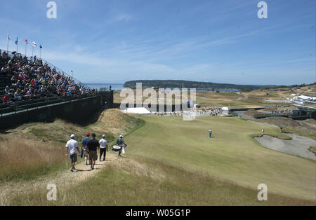 Golfers practice on the ninth hole prior to the start of the 115th U.S. Open Championship at Chambers Bay on June 16, 2015 in University Place, Washington. Photo by Terry Schmitt/UPI Stock Photo