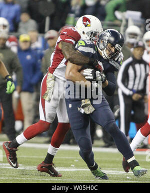 Seattle Seahawks tight end Jimmy Graham (88) brushes off a tackle by  Carolina Panthers outside linebacker A.J. Klein (56) at CenturyLink Field  in Seattle, Washington on December 4, 2016. Graham caught six