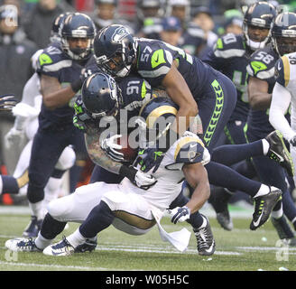 Seattle Seahawks outside linebacker Mike Morgan (57) wraps up