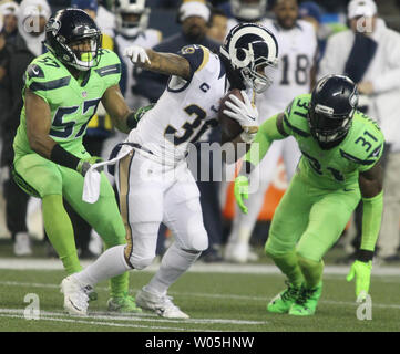 Seattle Seahawks' L.J. Collier walks off the field after an NFL football  practice Tuesday, May 21, 2019, in Renton, Wash. (AP Photo/Elaine Thompson  Stock Photo - Alamy