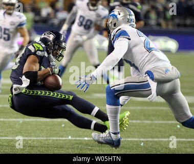 Seattle Seahawks wide receiver Doug Baldwin (89) hauls in a 10 yard pass against Detroit Lions cornerback Darius Slay (23) in a Wild Card round of the NFL playoffs at CenturyLink Field in Seattle, Washington on January 7, 2017.   The Seahawks beat the Lions 26 to 6 to advance in the playoffs.   Photo by Jim Bryant/UPI Stock Photo