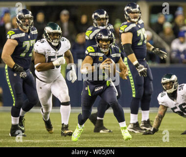 December 24, 2017: Seattle Seahawks quarterback Russell Wilson (3) runs the  ball during an NFL football