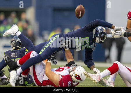 Seattle Seahawks defensive end Frank Clark (55) forces a fumble by Arizona Cardinals quarterback Josh Rosen (3) during the third quarter at CenturyLink Field on December 30, 2018 in Seattle, Washington.  Seattle Seahawks beat the Arizona Cardinals 27-24 in Seattle.   Photos by Jim Bryant/UPI Stock Photo
