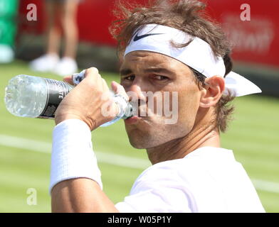 London, UK. 26th June, 2019. Rafael Nadal between games at the Aspall Tennis Classic - an annual Pre Wimbledon grass court Exhibition event - at the Hurlingham Club in London Credit: SOPA Images Limited/Alamy Live News Stock Photo