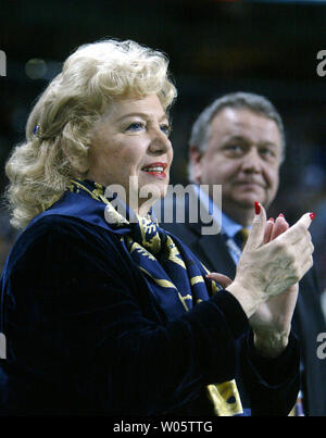 St. Louis Rams owner Georgia Frontiere claps after kicker Jeff Wilkens makes a field goal to take the lead against the  Baltimore Ravens in the third quarter at the Edward Jones Dome in St. Louis on November 9, 2003.     (UPI/Bill Greenblatt) Stock Photo