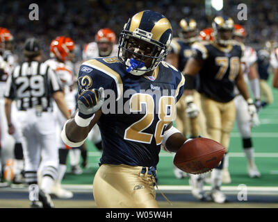 St. Louis Rams Marshall Faulk (L) congratulates Isaac Bruce after Bruce  scored a touchdown against the Seattle Seahawks in the first quarter at the  Edward Jones Dome in St. Louis on December