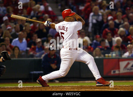 St. Louis Cardinals Albert Pujols breaks his bat as he grounds out in the  sixth inning against the Cincinnati Reds at Busch Stadium in St. Louis on  April 14, 2006. (UPI Photo/Bill