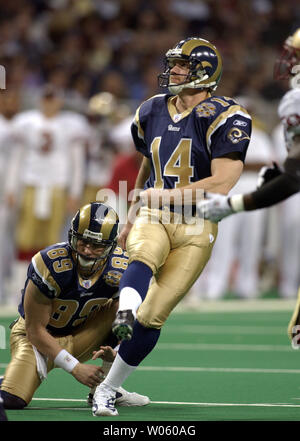 St. Louis Rams kicker Jeff Wilkens watches his first of three field goals on the day, go through the uprights with holder Dane Looker in the first quarter against the San Francisco 49er's at the Edward Jones Dome in St. Louis on December 5, 2004. St. Louis defeated San Francisco, 16-6.  (UPI Photo/Bill Gutweiler) Stock Photo