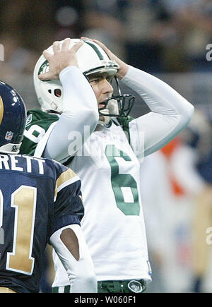 New York Jets place kicker Doug Brian cant belive he missed a 53-yard field goal that would have won the game against the St. Louis Rams in overtime at the Edward Jones Dome  in St. Louis on January 2, 2004. The kick was wide right. On the next possession the Rams took the ball down the field where place kicker Jeff Wilkens hit a 22-yard game winner. (UPI Photo/Bill Greenblatt) Stock Photo