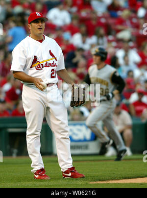 St. Louis Cardinals pitcher Jason Marquis watches the flight of the baseball over the wall as Pittsburgh Pirates Jason Bay trots home after hitting a solo homerun in the first inning at Busch Stadium in St. Louis on May 24, 2005.   (UPI Photo/Bill Greenblatt) Stock Photo
