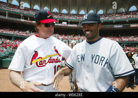 St. Louis Cardinals manager Tony LaRussa (L) greets former player New York Yankees Tony Womack before their game at Busch Stadium in St. Louis on June 12, 2005. The Cardinals awarded Womack with his World Series ring for his play in the 2004 World Series as a member of the Cardinals.    (UPI Photo/Bill Greenblatt)