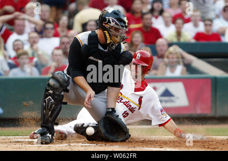 St. Louis Cardinals' So Taguchi connects for an infield single in