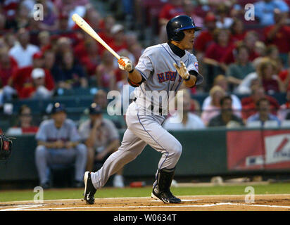 New York Mets' second baseman Kazuo Matsui comes in at the end of the half  inning as the Mets take on the Nationals who play their first game at Shea  Stadium in