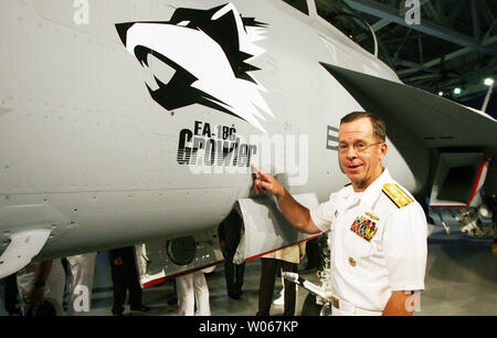 Admiral Michael Mullen, Chief of Naval Operations for the United States Navy, gets a closer look at the new EA-18G Growler airborne electronic aircraft, at the  Boeing aircraft assembly plant in St. Louis on August 3, 2006. The plane is a two-seat F/A-18F Super Hornet with an advanced weapons, sensors and communications systems. (UPI Photo/Bill Greenblatt) Stock Photo