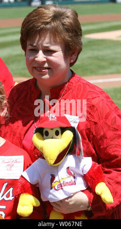 Maxine Clark, founder of Build-A-Bear industries holds one of the more popular items on sale at Busch Stadium, Fredbird,  during pre-game ceremonies before the Milwaukee Brewers-St. Louis Cardinals game in St. Louis on August 6, 2006. (UPI Photo/Bill Greenblatt) Stock Photo