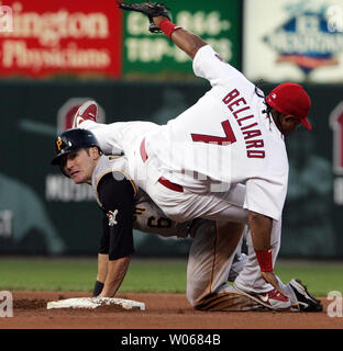 Pittsburgh Pirates Chris Duffy watches the completion of a double play while St. Louis Cardinals Ronnie Belliard falls over his back in the third inning at Busch Stadium in St. Louis on September 2, 2006. (UPI Photo/Bill Greenblatt) Stock Photo