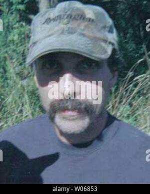 The New York State Police are trying to locate Ralph B. Phillips for questioning with regards to the shooting of a state trooper near the Chautauque County village of Frefonia, NY on June 10, 2006. Police say Phillips may have shot two state troopers on August 31 who were performing surveillance on his former girlfriend's house. One trooper, Joseph Longobardo (32) was killed with a shot to the leg with a high-powered rifle. (UPI Photo/New York State Police) Stock Photo