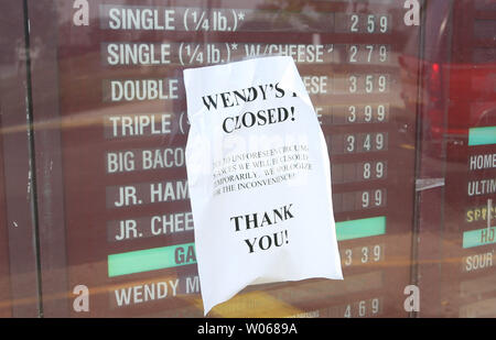 A closed sign greets customers on a drive-through menu due to the closing of two dozen Wendy's restaurants in the last two weeks in eastern Missouri and Southern Illinois on September 16, 2006. All of the area restaurants  were operated by WenAmerica of Chesterfield, Mo, the exclusive Wendy's franchisee in the St. Louis area. Two weeks ago, Wendy's International of Dublin, Ohio, terminated its franchise agreement with WenAmerica, which is in bankruptcy court. The company says some of the resturants may reopen within a few weeks. (UPI Photo/Bill Greenblatt) Stock Photo