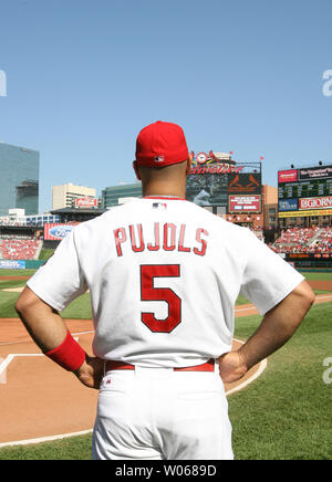 St. Louis Cardinals Albert Pujols watches a video tribute about himself on  the video screen before being named the St. Louis Cardinals recipient of  the Roberto Clemente Award on Roberto Clemente Day