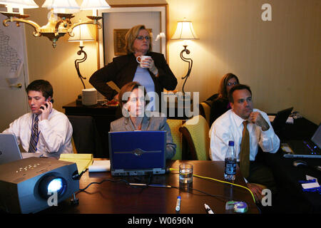 Missouri State Auditor and U.S. Senate hopeful Claire McCaskill (standing) watches election returns with staffers in her hotel room in St. Louis on November 7, 2006.  McCaskill, a Democrat and incumbent Jim Talent, are locked up in a virtual tie for the seat once held by President Harry Truman. (UPI Photo/Bill Greenblatt) Stock Photo