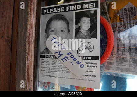 A flyer of kidnapping victim Shawn Hornbeck now has a 'They found me' sticker across the front at the Cobb Grocery Store in Richwoods, Missouri on January 19, 2007. Suspect Michael J. Devlin has been charged with one count of kidnapping in the case of then 11-year-old Hornbeck. Hornbeck and another boy were discovered on January 12 in Devlin's Kirkwood, Missouri apartment.   (UPI Photo/Bill Greenblatt) Stock Photo