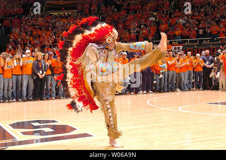 Chief Illiniwek, the mascot for the University of Illinois for the past 81 years, performs his last dance at halftime during the Michigan-Illinois basketball game at Assembly Hall in Champaign, Illinois on February 21, 2007. The University of Illinois mascot Chief Illiniwek was retired by the University after the NCAA imposed sanctions for having a mascot portraying offensive use of American Indian imagery.    (UPI Photo/Mark Jones) Stock Photo