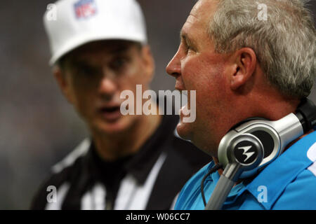 Referee Bill Leavy gets ready to look at a replay during NFL football game  against the St. Louis Rams in Detroit, Sunday, Oct. 10, 2010. The Lions  defeated the Rams 44-6. (AP