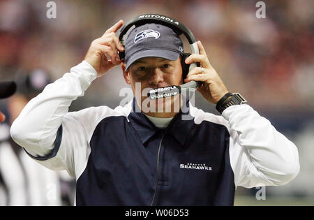 Seattle Seahawks assistant head coach Jim Mora adjusts his headset during a game against the St. Louis Rams at the Edward Jones Dome in St. Louis on November 25, 2007. (UPI Photo/Bill Greenblatt) Stock Photo