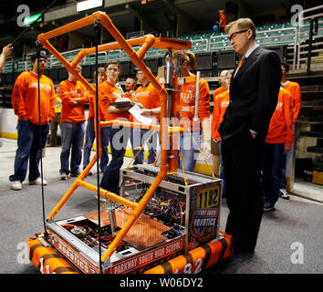 Missouri Governor Matt Blunt (R) watches the operation of a robot built by Parkway South students at the For Inspiration and Recognition of Science and Technology (FIRST) Robotics St. Louis Regional Tournament at the Family Arena in St. Charles, Missouri on February 29, 2008. The FIRST Robotics Challenge is a program that challenges young people, working with professional mentors, to design and build a robot in six weeks.  (UPI Photo/Bill Greenblatt) Stock Photo