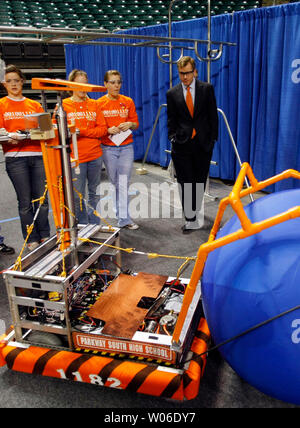 Missouri Governor Matt Blunt (R) watches the operation of a robot built by Parkway South students at the For Inspiration and Recognition of Science and Technology (FIRST) Robotics St. Louis Regional Tournament at the Family Arena in St. Charles, Missouri on February 29, 2008. The FIRST Robotics Challenge is a program that challenges young people, working with professional mentors, to design and build a robot in six weeks.  (UPI Photo/Bill Greenblatt) Stock Photo