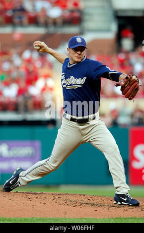 San Diego Padres pitcher Jake Peavy, right, is greeted by Arizona ...