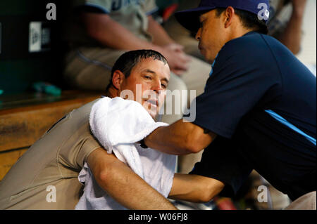 San Diego Padres pitcher Greg Maddux (L) tries to cool down with cold towels during a game against the St. Louis Cardinals at Busch Stadium in St. Louis on July 18, 2008. (UPI Photo/Bill Greenblatt) Stock Photo