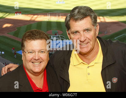 Chicago Cubs broadcasters Ron Santo (L) and Pat Hughes pose for a  photograph before a game between the Cubs and the St. Louis Cardinals at  Busch Stadium in St. Louis on September