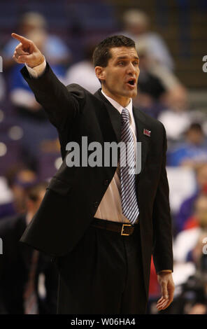 Northern Iowa head coach Ben Jacobson yells to his team in the first ...