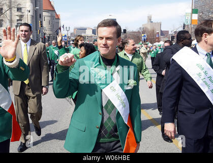 St. Louis Rams General Manager Billy Devanney pumps his fist as he marches in the St. Patrick's Day Parade in St. Louis on March 14, 2009. (UPI Photo/Bill Greenblatt) Stock Photo