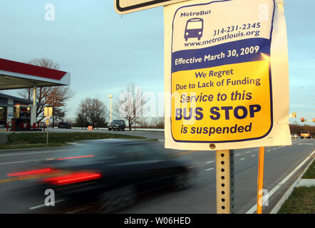 A plastic sign covers a bus stop sign as the most severe public transit service cuts in the nation begin with the morning rush hour in Ballwin, Missouri on March 30, 2009. Metro, the local bus and light rail line, says 50-million dollars needs to be trimmed to balance the budget with dozens of bus lines have being discontinued.  Hundreds of employees are being laid off, and most areas in the western section of the St. Louis region will have no service at all. The service cuts primarily affect the Missouri side of the bi-state area where state financing is far less than levels in Illinois.  (UP Stock Photo