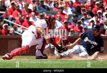 Milwaukee Brewers' J.J. Hardy slides home during the fourth inning of a  baseball game Thursday, May 14, 2009, in Milwaukee. (AP Photo/Morry Gash  Stock Photo - Alamy