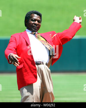 Baseball Hall of Famer and former St. Louis Cardinals great Lou Brock and  his wife Jackie talk to fans on the field before a game between the  Cardinals and the Boston Red