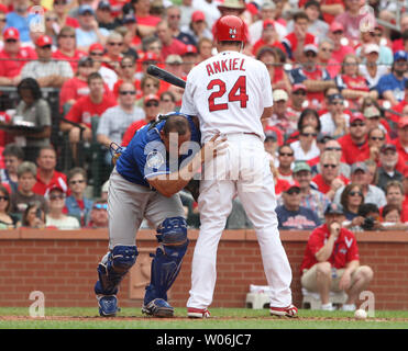 Kansas City Royals catcher Miguel Olivo (L) tries to get past St. Louis Cardinals Rick Ankiel for the loose baseball after Ankiel strikes out in the first inning at Busch Stadium in St. Louis on May 24, 2009. Kansas City won the game 3-2.  (UPI Photo/Bill Greenblatt) Stock Photo