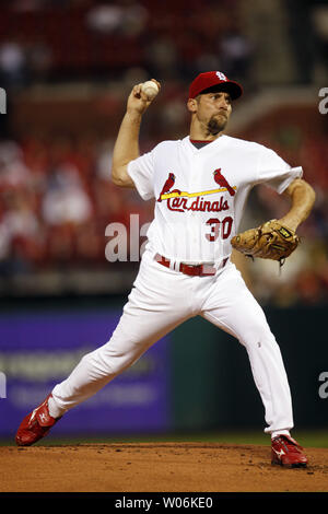 New St. Louis Cardinals starting pitcher John Smoltz delivers a pitch