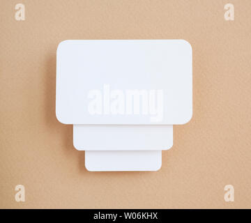 paper speech bubbles on brown background Stock Photo