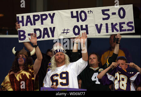 Minnesota Vikings fans hold up 'Defence' signs in support of their team  before the International Series NFL match at Twickenham, London Stock Photo  - Alamy