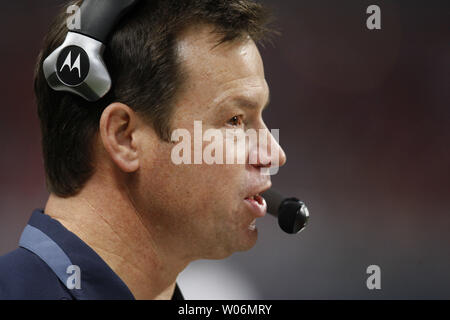 Seattle Seahawks head football coach Jim Mora talks on his headset during the fourth quarter against the St. Louis Rams at the Edward Jones Dome in St. Louis on November 29, 2009. Seattle defeated St. Louis 27-17.   UPI/Bill Greenblatt Stock Photo