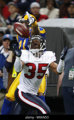 Houston Texans Jacques Reeves (35) almost picks a football intended for St. Louis Rams Brandon Gibson in the fourth quarter at the Edward Jones Dome in St. Louis on December 20, 2009.  Houston defeated St. Louis 16-13.   UPI/Bill Greenblatt Stock Photo