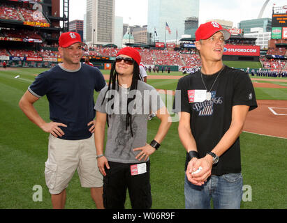 Members of the rock band Fuel are introduced before the Cincinnati Reds- St. Louis Cardinals baseball game at Busch Stadium in St. Louis on May 31, 2010. Fuel is (L ro R) Ken Shaulk, Brad Stewart and lead singer Brett Scallions.   UPI/Bill Greenblatt Stock Photo