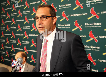 St. Louis Cardinals General Manager John Mozeliak presents catcher