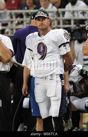 Former St. Louis Rams quarterback Marc Bulger now a member of the Baltimore Ravens, holds wires for a coach during the first quarter against his old team in pre-season play at the Edward Jones Dome in St. Louis on September 2, 2010.   UPI/BIll Greenblatt Stock Photo