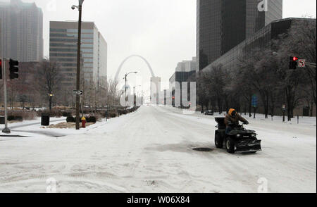 The only thing moving on the usual busy Market Street is a snow plow as ice and slush fill the streets and sidewalks in St. Louis on February 1, 2011.  St. Louis is bracing for 10-12 inches of snow following two days of sleet and rain. Officials are expecting winter blizzard conditions after a state of emergency has been declared by the Governor of Missouri.   UPI/Bill Greenblatt Stock Photo